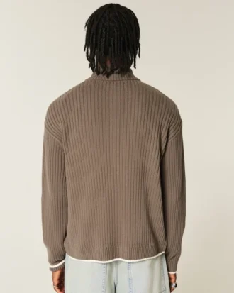 Afslappet sweater med grafisk lynlås
