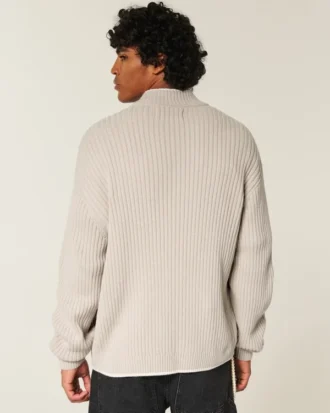 Afslappet sweater med grafisk lynlås