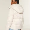 All-weather pufferjakke med imiteret pelsfor All-weather pufferjakke med imiteret pelsfor