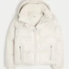 All-weather pufferjakke med imiteret pelsfor All-weather pufferjakke med imiteret pelsfor