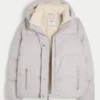 All-weather pufferjakke med imiteret pelsfor All-weather pufferjakke med imiteret pelsfor