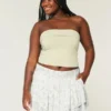 Asymmetrisk mini-skort med lagdelt kant Asymmetrisk mini-skort med lagdelt kant