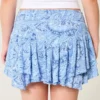 Asymmetrisk mini-skort med lagdelt kant Asymmetrisk mini-skort med lagdelt kant