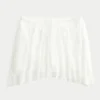 Asymmetrisk miniskirt med blonder Asymmetrisk miniskirt med blonder