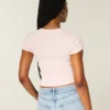 Baby-T-shirt med hot chocolate-motiv Baby-T-shirt med hot chocolate-motiv