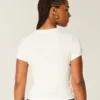 Baby-T-shirt med sommerfuglemotiv Baby-T-shirt med sommerfuglemotiv