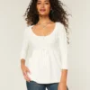 Babydoll-sweater i kabelstrik Babydoll-sweater i kabelstrik
