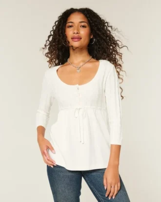 Babydoll-sweater i kabelstrik