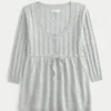 Babydoll-sweater i kabelstrik