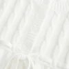 Babydoll-sweater i kabelstrik Babydoll-sweater i kabelstrik
