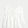 Babydoll-top med bindebånd foran Babydoll-top med bindebånd foran