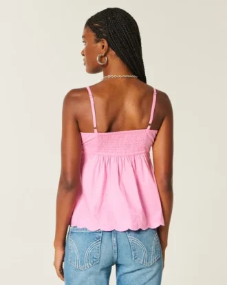 Babydoll-top med broderi og glimmer