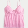 Babydoll-top med broderi og glimmer
