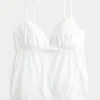 Babydoll-top med broderi og glimmer Babydoll-top med broderi og glimmer