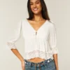 Babydoll-top med trekvartærmer Babydoll-top med trekvartærmer