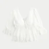 Babydoll-top med trekvartærmer Babydoll-top med trekvartærmer