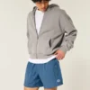 Baggy fodboldshorts til midt på låret