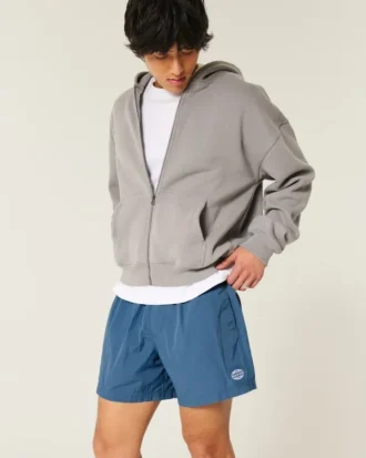 Baggy fodboldshorts til midt på låret
