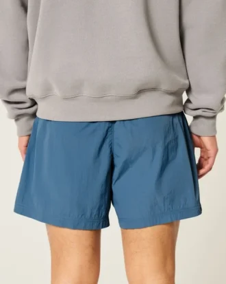 Baggy fodboldshorts til midt på låret
