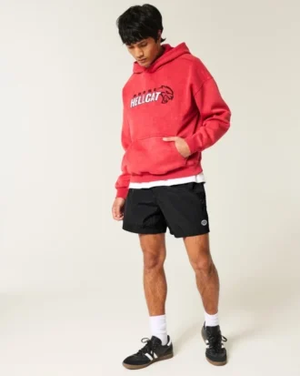 Baggy fodboldshorts til midt på låret