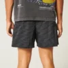 Baggy fodboldshorts til midt på låret