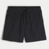 Baggy fodboldshorts til midt på låret