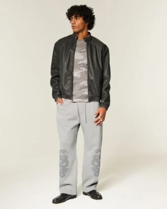 Baggy sweatpants med dobbelt slangegrafik