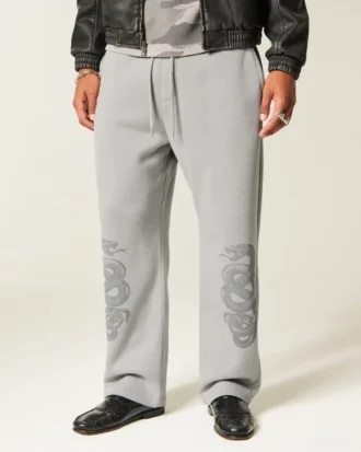 Baggy sweatpants med dobbelt slangegrafik
