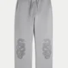 Baggy sweatpants med dobbelt slangegrafik Baggy sweatpants med dobbelt slangegrafik