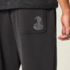Baggy sweatpants med slangegrafik Baggy sweatpants med slangegrafik