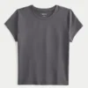 Blød, strækbar baby-T-shirt i sømløst stof Blød, strækbar baby-T-shirt i sømløst stof