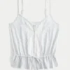 Blonderdetaljeret peplum-top