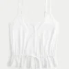 Blonderdetaljeret peplum-top