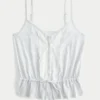 Blonderdetaljeret peplum-top