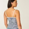 Blonderdetaljeret peplum-top
