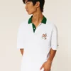 Boxy University of Miami Hurricanes grafisk polo Boxy University of Miami Hurricanes grafisk polo