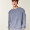 Boxy vasket sweater med rund hals