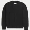 Boxy vasket sweater med rund hals