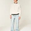 Boxy vasket sweater med rund hals