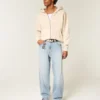 Broderede lysvaskede skaterbaggy jeans Broderede lysvaskede skaterbaggy jeans
