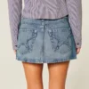 Broderet stjerne-lomme denim mini-skort Broderet stjerne-lomme denim mini-skort
