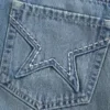 Broderet stjerne-lomme denim mini-skort Broderet stjerne-lomme denim mini-skort