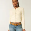 Cardigan med hulmønster Cardigan med hulmønster