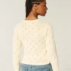 Cardigan med hulmønster Cardigan med hulmønster