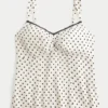 Chiffon-tanktop med blondekant Chiffon-tanktop med blondekant