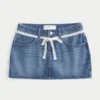 Denim miniskort med blonder og bånd Denim miniskort med blonder og bånd