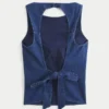 Denim-top med åben ryg Denim-top med åben ryg