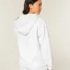 Faux fur-foret fleece-cardigan uden lukning Faux fur-foret fleece-cardigan uden lukning