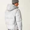 Faux fur-foret pufferjakke med hætte Faux fur-foret pufferjakke med hætte