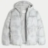Faux fur-foret pufferjakke med hætte Faux fur-foret pufferjakke med hætte
